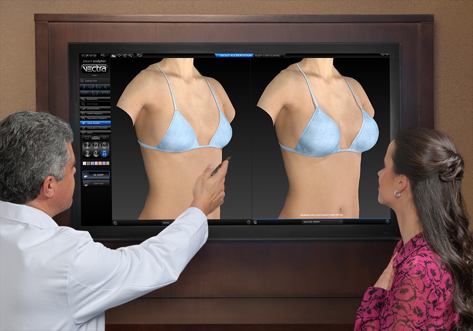 Doctor showing patient interactive vectra